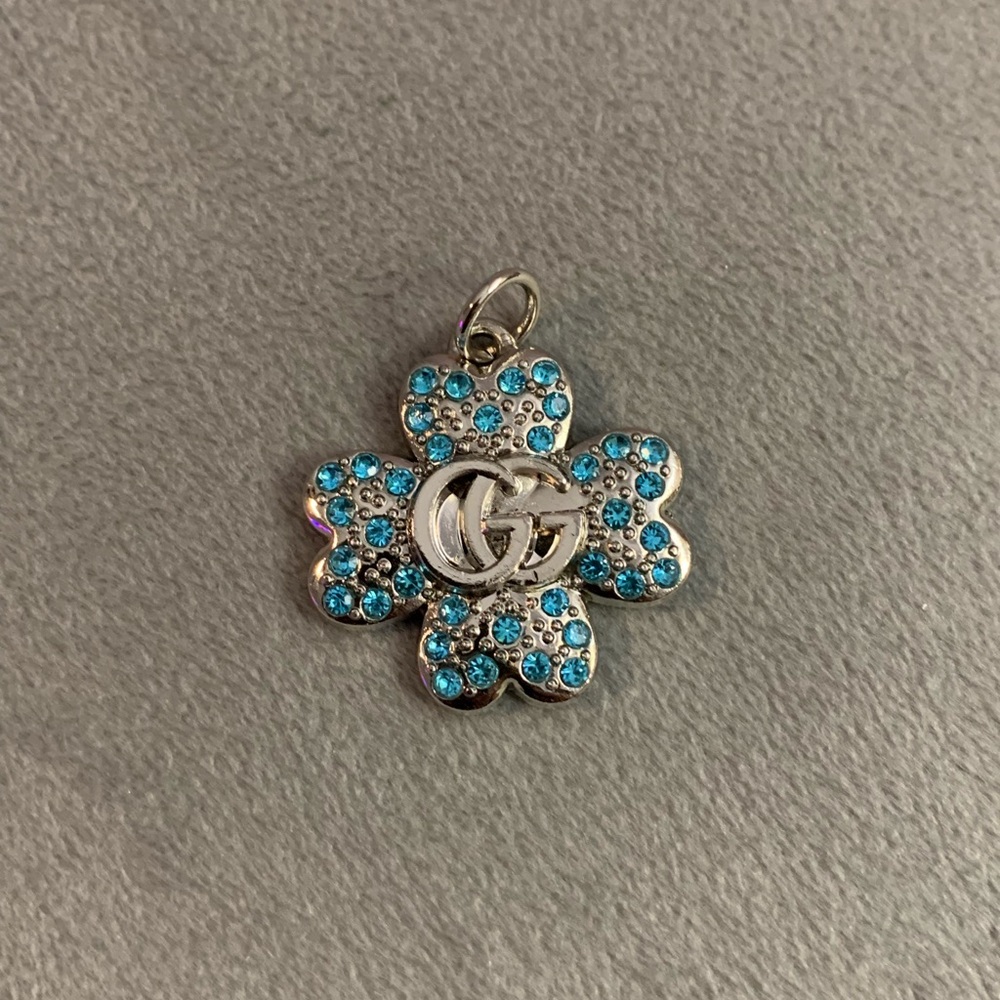 Upcycled Silver and Blue Rhinestone Clover Pendant